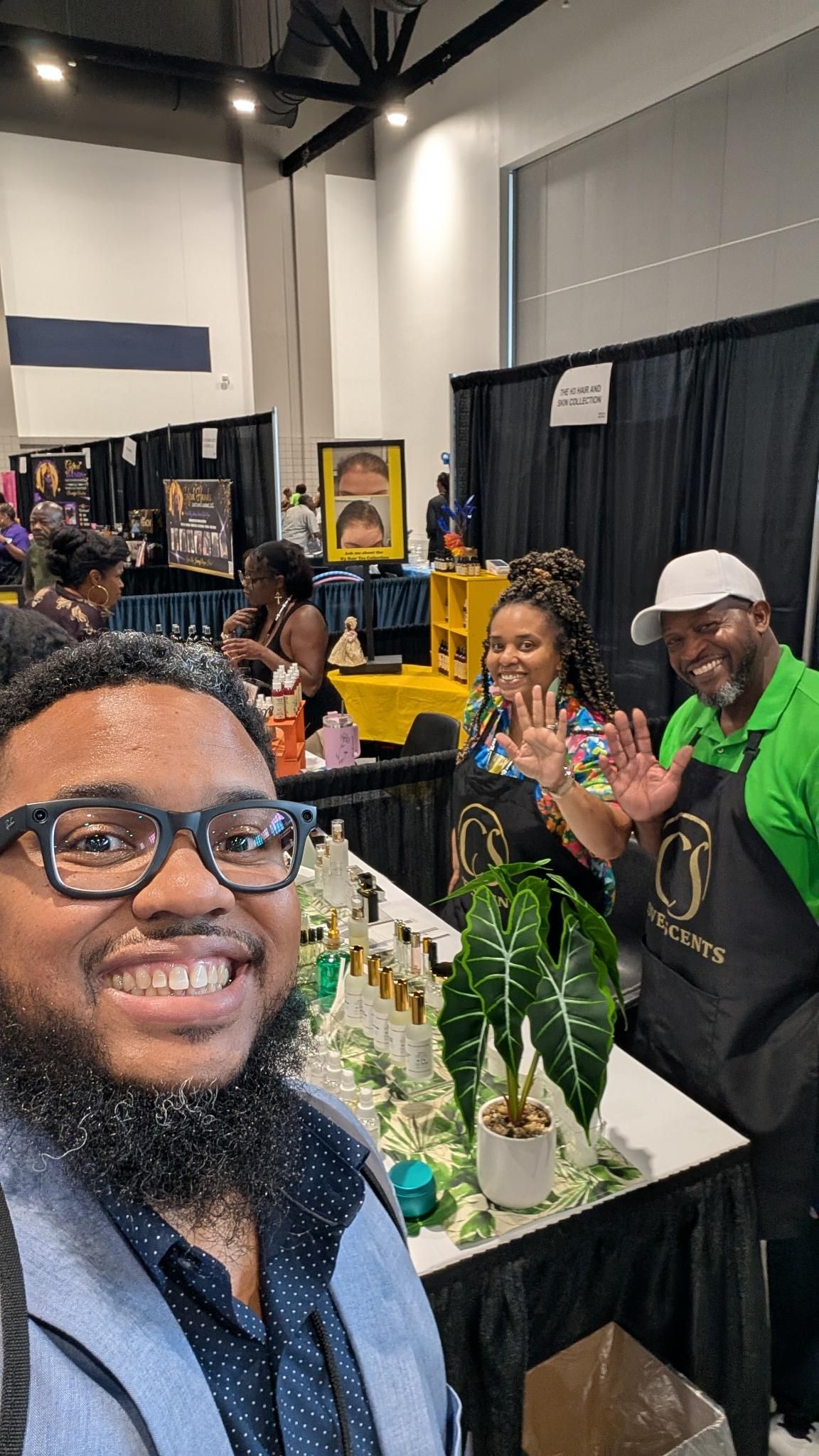 Micah King taking a selfie with Cove Scents owners