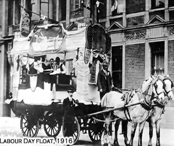 Historical photograph of an early 20th-century Labor Day parade float celebrating skilled trade workers