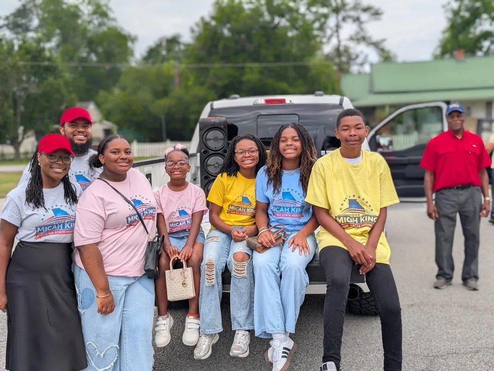 Supporters wearing Micah King campaign gear at the Glennville Sweet Onion Parade